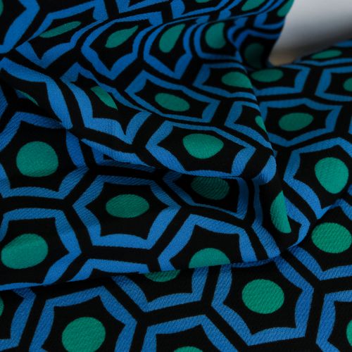Polyester crêpe met blauw abstract motief